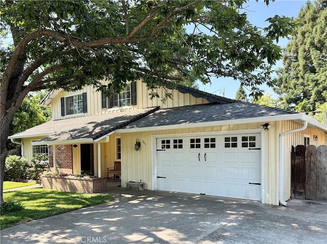 2817 San Verbena Way, Chico, CA 95973 - view of front of property featuring an attached garage, concrete driveway, board and batten siding, and a shingled roof