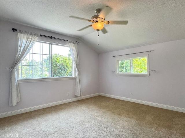 2817 San Verbena Way, Chico, CA 95973 - carpeted empty room featuring vaulted ceiling, a textured ceiling, and ceiling fan