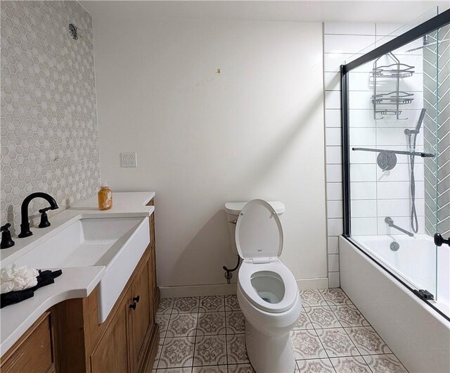 1608 Millet Ave, South El Monte, CA 91733 - full bath with bath / shower combo with glass door, vanity, and tile patterned flooring