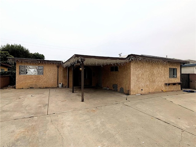 1608 Millet Ave, South El Monte, CA 91733 - rear view of house featuring stucco siding and a patio
