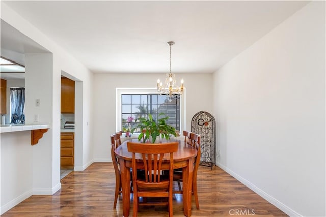 854 N Harbor Blvd, La Habra, CA 90631 - dining room featuring a chandelier and wood finished floors