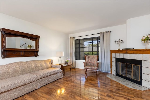 854 N Harbor Blvd, La Habra, CA 90631 - living area with wood finished floors and a tiled fireplace