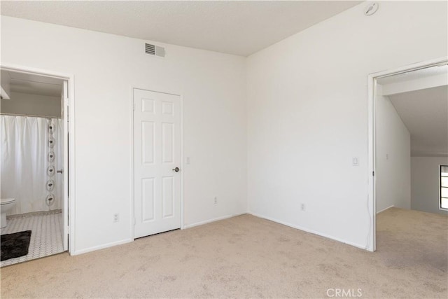 854 N Harbor Blvd, La Habra, CA 90631 - unfurnished bedroom with carpet flooring and ensuite bath