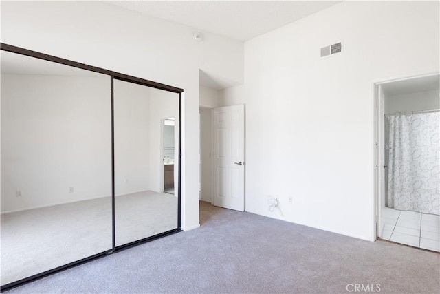 854 N Harbor Blvd, La Habra, CA 90631 - unfurnished bedroom with carpet, connected bathroom, and a closet