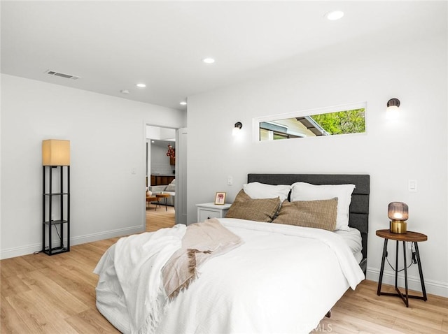 11410 Reseda Blvd, Porter Ranch, CA 91326 - bedroom with light wood-type flooring and recessed lighting