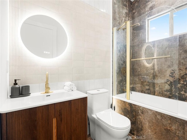 11410 Reseda Blvd, Porter Ranch, CA 91326 - bathroom featuring tile walls, tiled shower / bath combo, and vanity