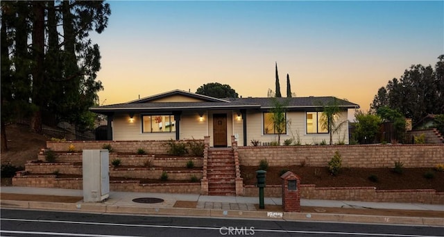 11410 Reseda Blvd, Porter Ranch, CA 91326 - view of front of property featuring stairway and a porch