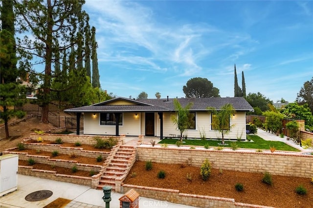 11410 Reseda Blvd, Porter Ranch, CA 91326 - ranch-style house with stairway, a patio, and a porch
