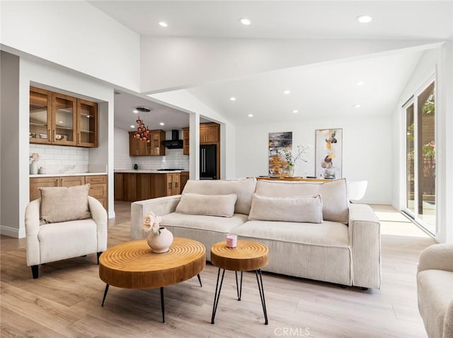 11410 Reseda Blvd, Porter Ranch, CA 91326 - living area featuring lofted ceiling, light wood-style floors, and recessed lighting