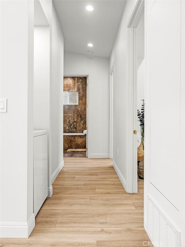 11410 Reseda Blvd, Porter Ranch, CA 91326 - corridor featuring light wood-style floors, recessed lighting, and washer / dryer