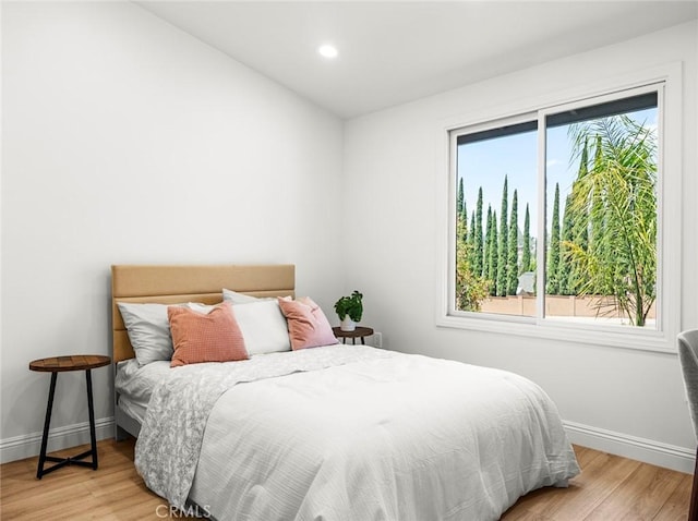 11410 Reseda Blvd, Porter Ranch, CA 91326 - bedroom with wood finished floors and recessed lighting
