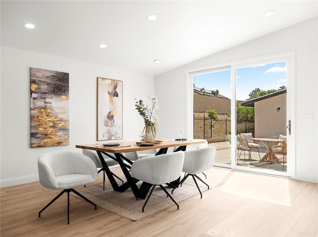 11410 Reseda Blvd, Porter Ranch, CA 91326 - dining space with light wood-style flooring, vaulted ceiling, and recessed lighting