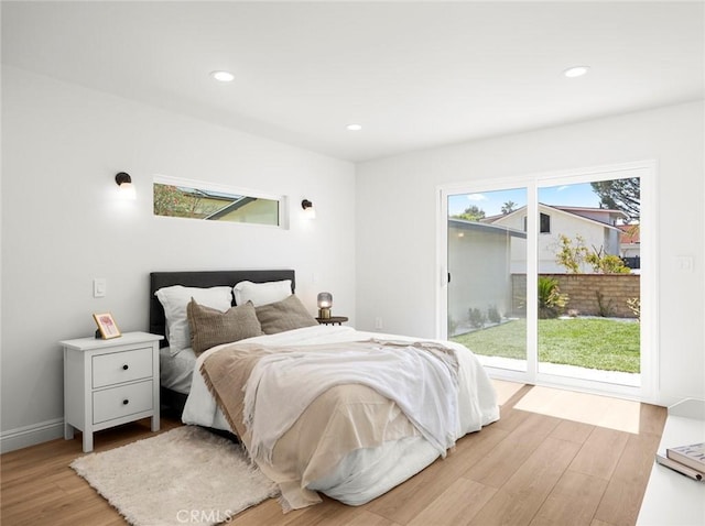 11410 Reseda Blvd, Porter Ranch, CA 91326 - bedroom featuring access to outside, light wood finished floors, and recessed lighting