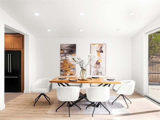 11410 Reseda Blvd, Porter Ranch, CA 91326 - dining room featuring light wood-style flooring and recessed lighting