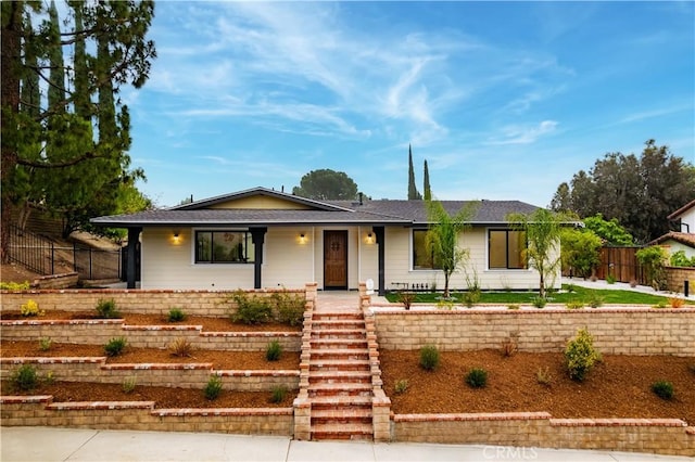 11410 Reseda Blvd, Porter Ranch, CA 91326 - view of front of house with a porch and stairway