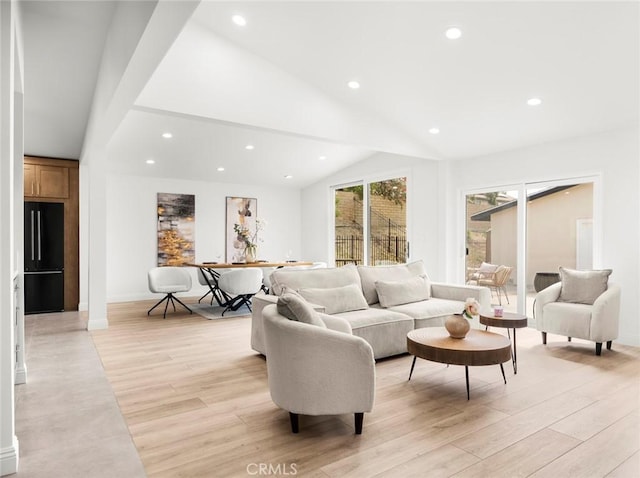 11410 Reseda Blvd, Porter Ranch, CA 91326 - living room with recessed lighting, vaulted ceiling, and light wood-style flooring