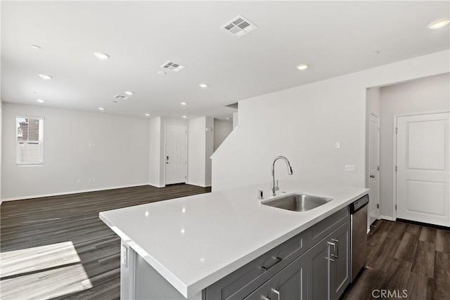 36390 W Flare, Winchester, CA 92569 - kitchen featuring dark wood finished floors, light countertops, a kitchen island with sink, dishwasher, and recessed lighting