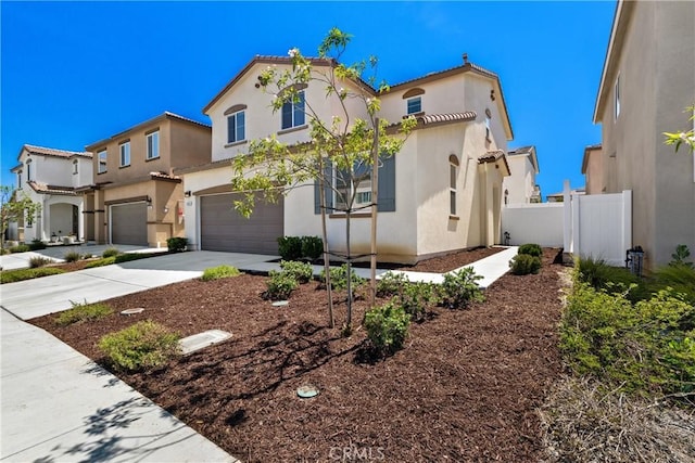 36390 W Flare, Winchester, CA 92569 - mediterranean / spanish-style house featuring stucco siding, an attached garage, and concrete driveway