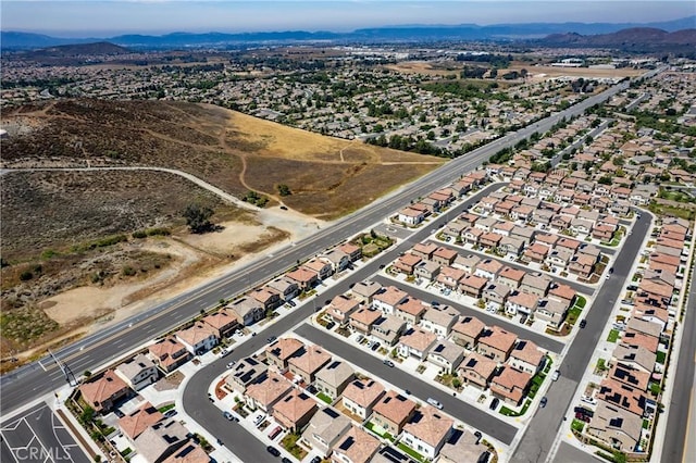 36390 W Flare, Winchester, CA 92569 - aerial overview of property's location with a mountain backdrop and nearby suburban area
