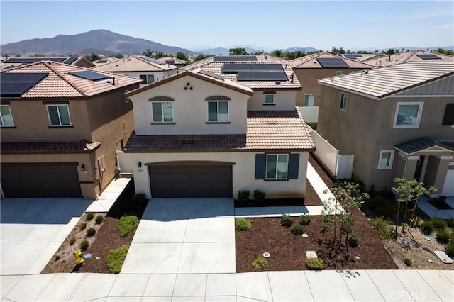 36390 W Flare, Winchester, CA 92569 - view of front of property with stucco siding, driveway, an attached garage, a mountain view, and a tiled roof
