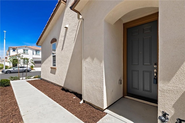 36390 W Flare, Winchester, CA 92569 - view of exterior entry featuring stucco siding