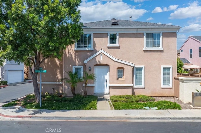 14840 Dove Tree Ct, Tustin, CA 92780 - view of front of home with stucco siding