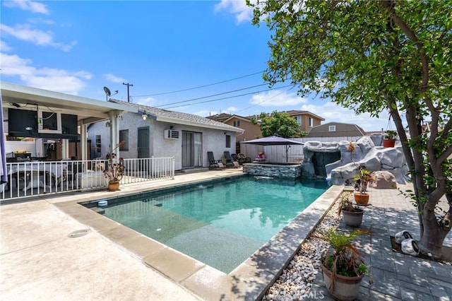 10422 Patricia Dr, Garden Grove, CA 92840 - view of swimming pool featuring a fenced backyard, a patio area, and a wall unit AC