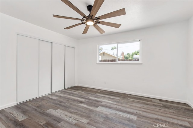 4215 Sherman Dr, Riverside, CA 92503 - unfurnished bedroom with wood finished floors, a closet, and a ceiling fan