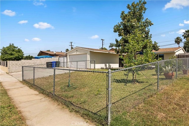 26920 14th St, Highland, CA 92346 - view of front of house with stucco siding and concrete driveway