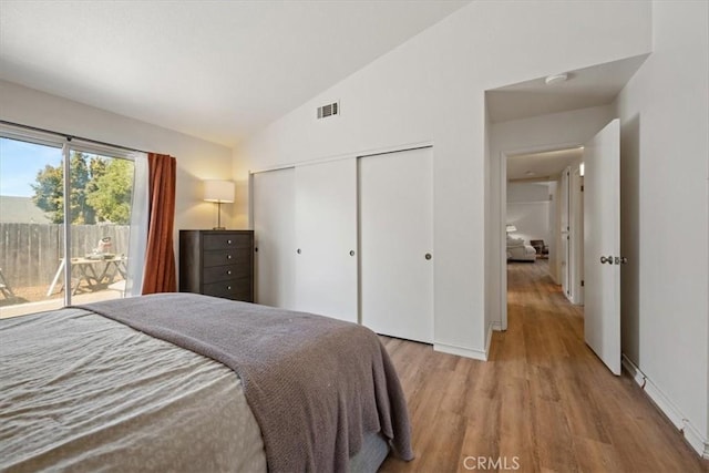 1288 Capitola St, Grover Beach, CA 93433 - bedroom featuring access to outside, vaulted ceiling, wood finished floors, and a closet