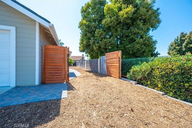 1288 Capitola St, Grover Beach, CA 93433 - view of yard with a garage