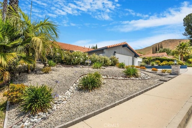 28639 Quaint St, Agoura Hills, CA 91301 - view of front of property with a tile roof, a garage, a mountain view, and driveway