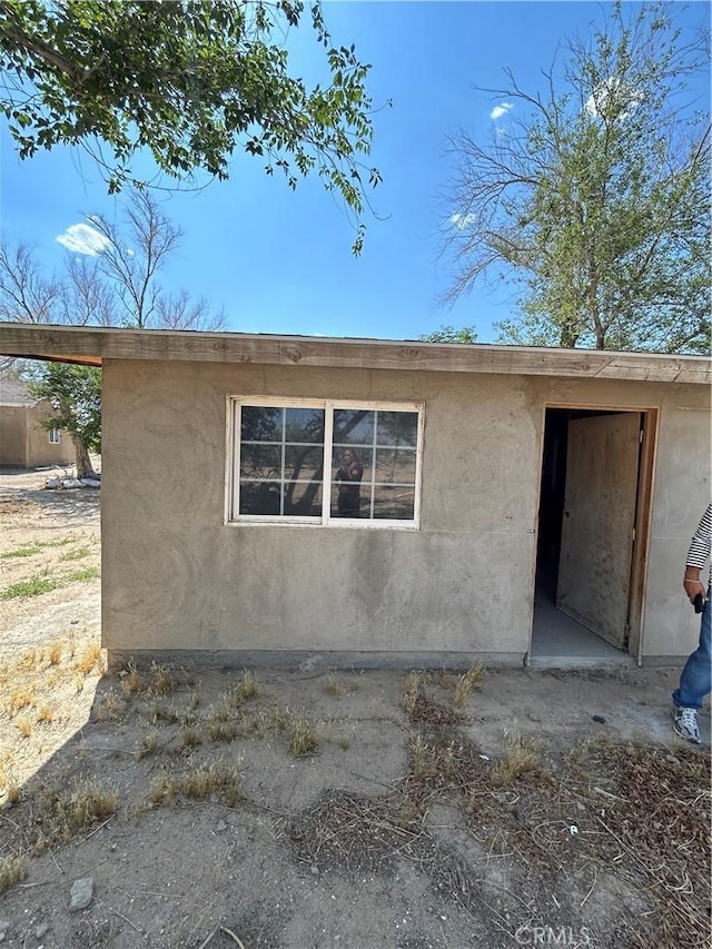 35862 Rabbit Spring Rd, Lucerne Valley, CA 92356 - view of home's exterior with stucco siding