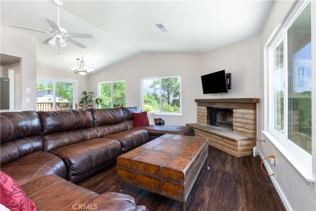 4725 Arena Ave, Atascadero, CA 93422 - living area featuring dark wood-type flooring, lofted ceiling, a fireplace, a ceiling fan, and a chandelier