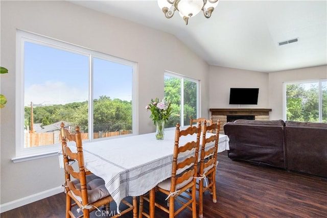4725 Arena Ave, Atascadero, CA 93422 - dining room featuring dark wood finished floors, a chandelier, healthy amount of natural light, and lofted ceiling
