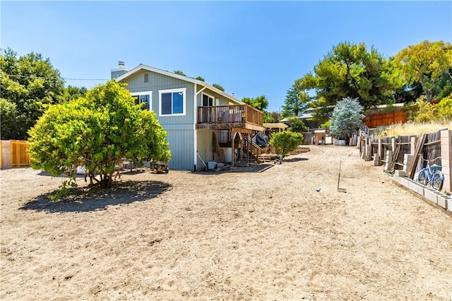 4725 Arena Ave, Atascadero, CA 93422 - fenced backyard featuring stairway and a wooden deck