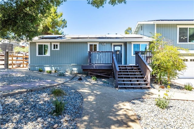 4725 Arena Ave, Atascadero, CA 93422 - manufactured / mobile home with stairway, a wooden deck, and solar panels