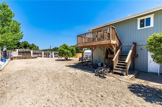 4725 Arena Ave, Atascadero, CA 93422 - back of property with stairs, a wooden deck, and a fenced backyard