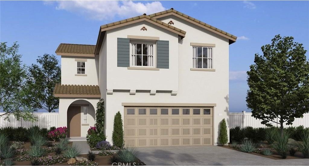 14197 Cielo St, Moreno Valley, CA 92555 - mediterranean / spanish home featuring a tile roof, stucco siding, driveway, and an attached garage