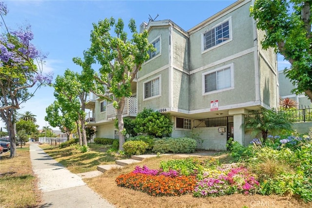1566 Pine Ave Unit 207A, Long Beach, CA 90813 - view of front of home featuring stucco siding