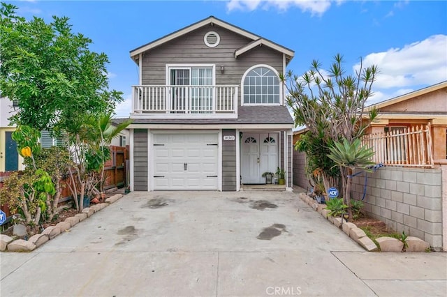 14343 Marilla Ave, Norwalk, CA 90650 - traditional-style home with an attached garage, driveway, and a balcony