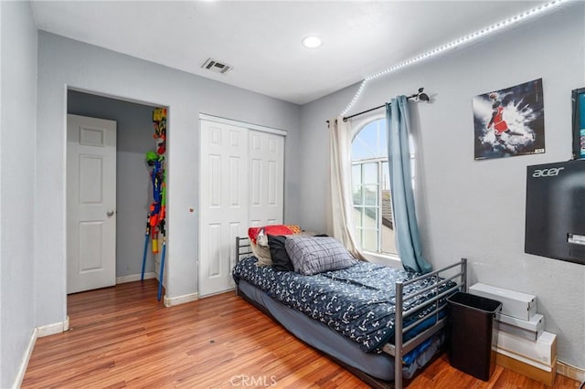 14343 Marilla Ave, Norwalk, CA 90650 - bedroom featuring light wood-style floors, a closet, and recessed lighting