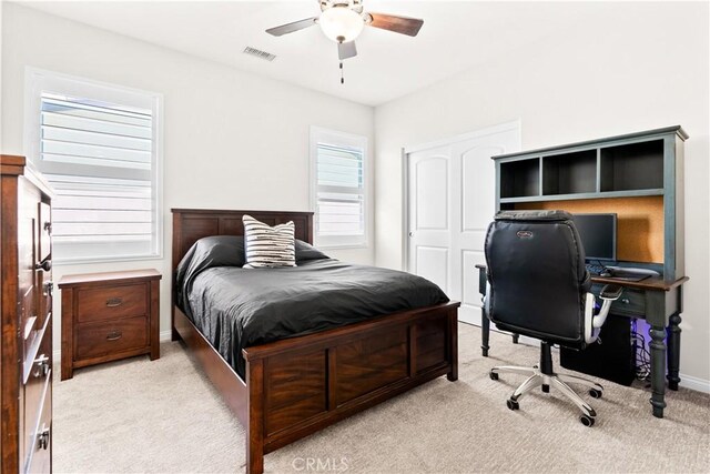 27 Cache St, Rancho Mission Viejo, CA 92694 - bedroom featuring light colored carpet, a desk, ceiling fan, and a closet