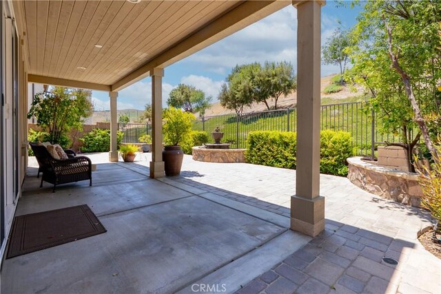 27 Cache St, Rancho Mission Viejo, CA 92694 - fenced backyard featuring a patio area
