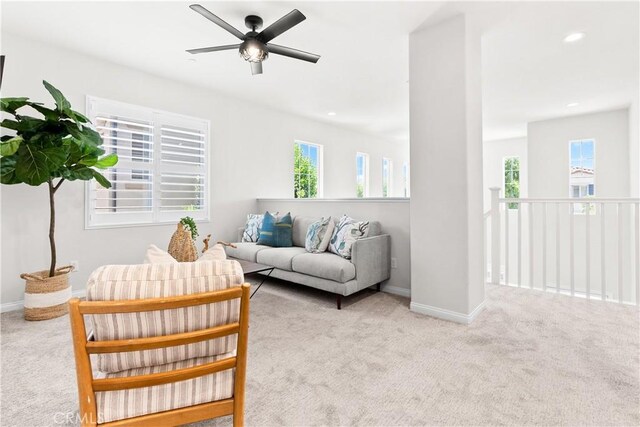 27 Cache St, Rancho Mission Viejo, CA 92694 - carpeted living room with healthy amount of natural light, a ceiling fan, and recessed lighting