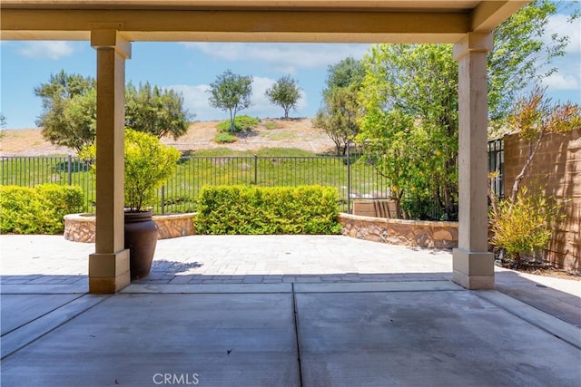 27 Cache St, Rancho Mission Viejo, CA 92694 - fenced backyard with a patio