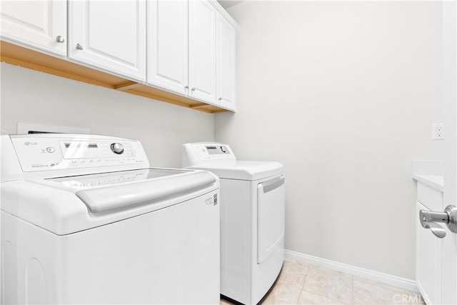 27 Cache St, Rancho Mission Viejo, CA 92694 - washroom featuring washer and dryer and cabinet space