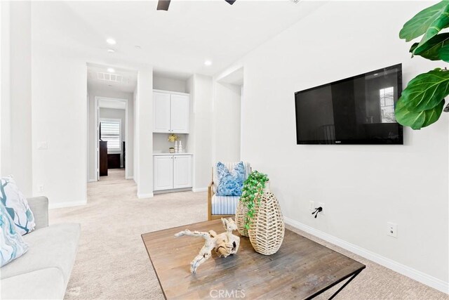 27 Cache St, Rancho Mission Viejo, CA 92694 - living room with light carpet, recessed lighting, and ceiling fan
