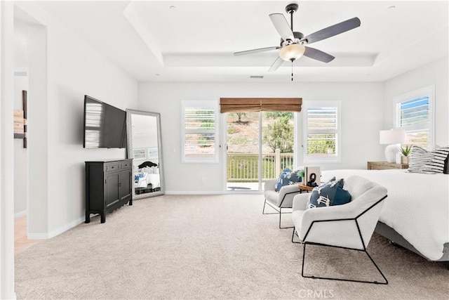 27 Cache St, Rancho Mission Viejo, CA 92694 - living area with a raised ceiling, healthy amount of natural light, and light colored carpet