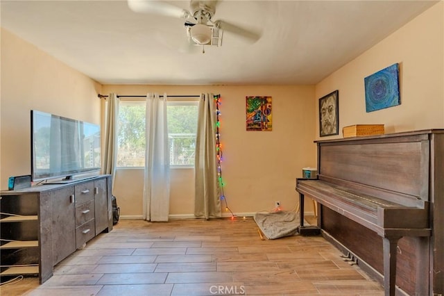 9668 W Rosamond Blvd, Rosamond, CA 93560 - sitting room with ceiling fan and wood finish floors